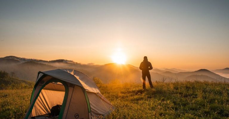 Camping - Silhouette of Person Standing Near Camping Tent