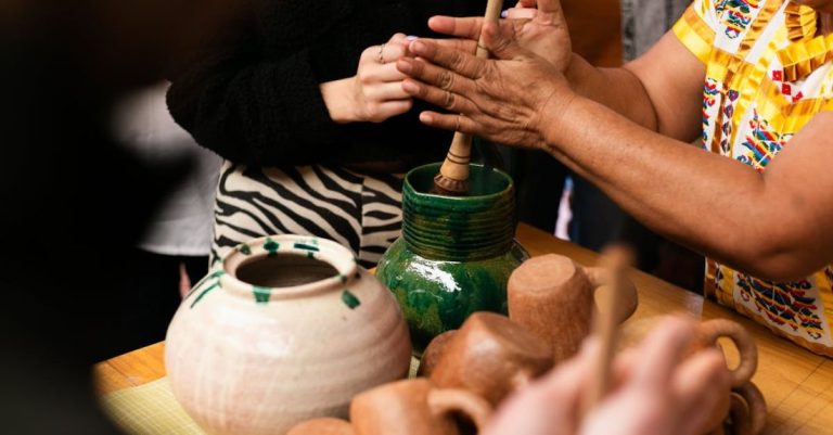Artisans - Women Hands Making Vases